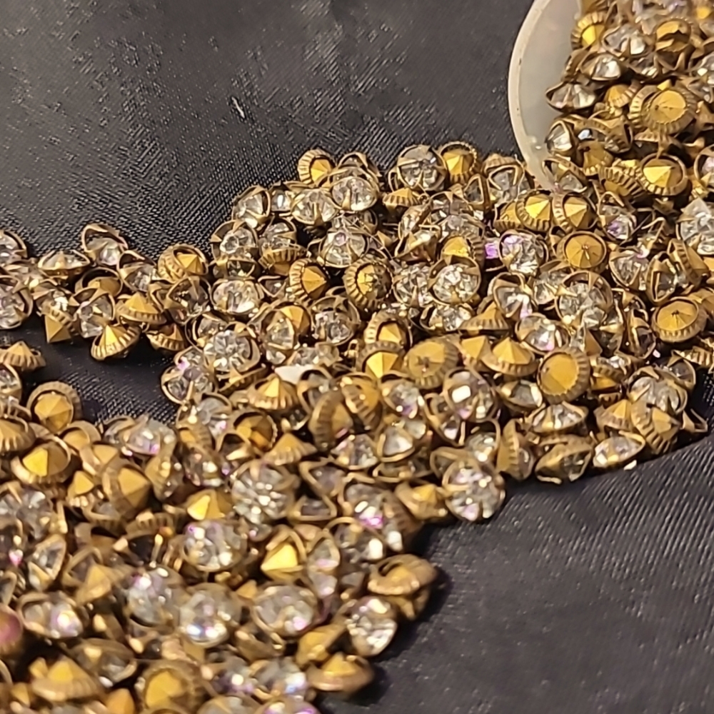 554 pieces 1920s original rhinestones 25 cents a piece.